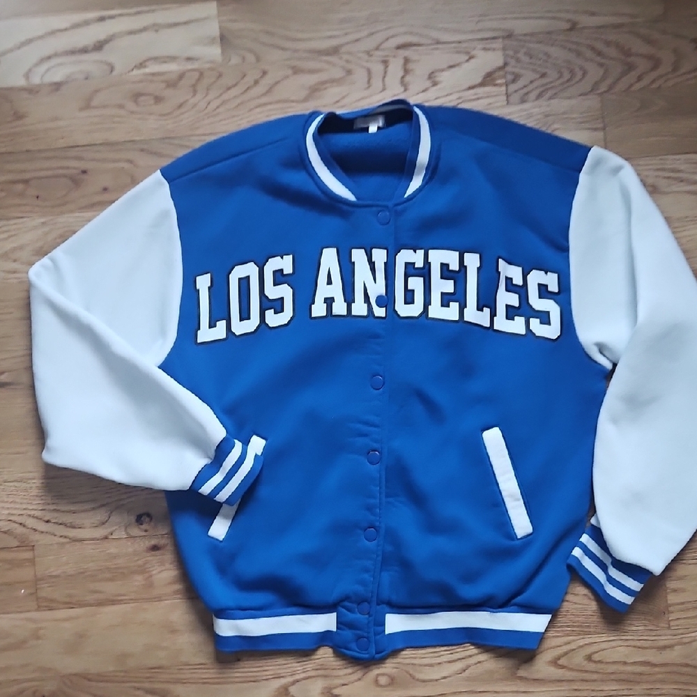 Blue and White Varsity Stlye Jacket Size Large.